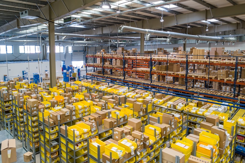 Small business owner preparing packages at a fulfillment desk